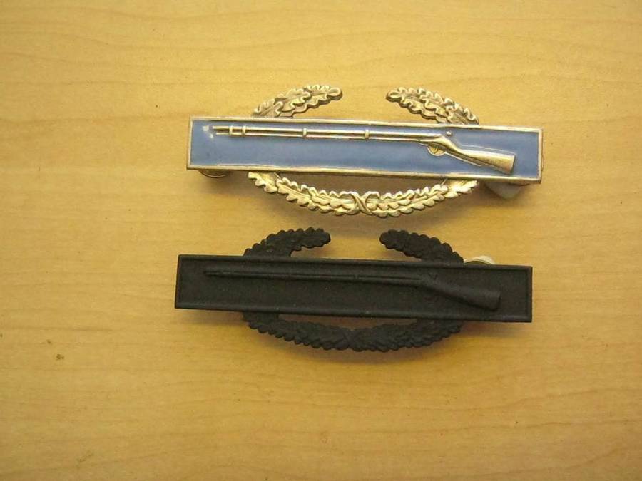 Lot of 2 US Army combat infantry badges.